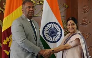 Sri Lankan Foreign Minister Mangala Samaraweera with Indian Foreign Minister Sushma Swaraj before a meeting in Delhi on January 18, 2015