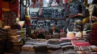 A trader inside the Qaysari Bazaar in Erbil