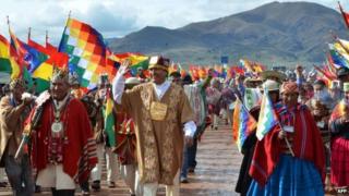 Bolivian President Evo Morales (C) participating in a ritual ceremony at the archaeological site of Tiwanaku, about 70 km from La Paz, ahead of his swearing-in for a third mandate, on January 21, 2015
