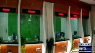 Chinese TV footage of inside the bank showing the counters