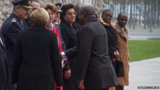 Mr Nketia alongside other officials in a receiving line in Germany