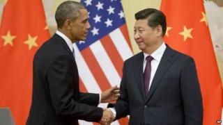 Chinese President Xi Jinping and his US counterpart, Barack Obama, shake hands at the end of their joint news conference at the Great Hall of the People in Beijing on 12 November 2014.