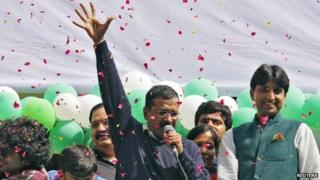 Aam Aadmi (Common Man) Party (AAP) chief and its chief ministerial candidate for Delhi, Arvind Kejriwal (C) addresses his supporters in New Delhi February 10, 2015.