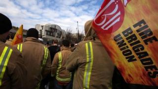Firefighters attending a union rally