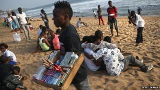 People on the beach in Monrovia, Liberia