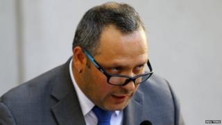 Sebastian Davalos, son of Chile's President Michelle Bachelet, delivers a declaration before resigning his position at the presidential palace in Santiago, 13 February 2015.