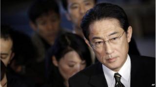 Japanese Foreign Minister Fumio Kishida, right, listens to questions from journalists on Japanese journalist Kenji Goto taken hostage by the Islamic State group, at the prime minister's official residence in Tokyo, Friday, 30 January 2015