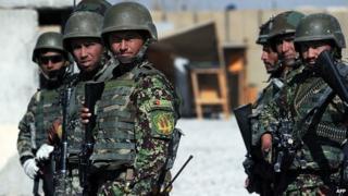 Afghan soldiers on foot patrol on 10 December 2014