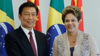 China's Vice President Li Yuanchao shakes hands with President Dilma Rousseff in Brasilia on 2 January, 2015.