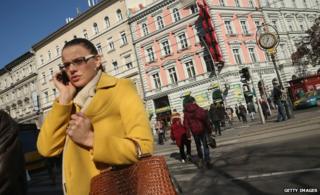 Woman talks on mobile phone in Budapest (file pic)