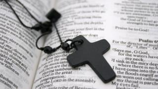 A cross on a bible