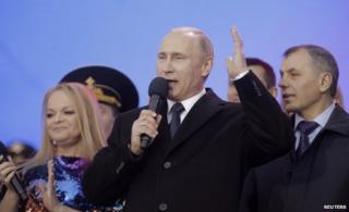 Russian President Vladimir Putin addresses crowd at Kremlin (18 March)