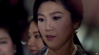 This file photo taken on January 22, 2015 shows ousted Thai prime minister Yingluck Shinawatra looking on after facing impeachment proceedings by the military-stacked National Legislative Assembly (NLA) at the parliament in Bangkok.