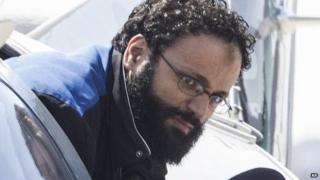 Chiheb Esseghaier, one of two suspects accused of plotting with al-Qaida in Iran to derail a train in Canada, arrives at Buttonville Airport just north of Toronto 23 April 2013