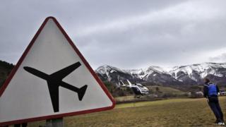 Sign warning of low flying aircraft near the spot where a Germanwings airbus crashed, 24 March 2015