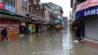 A flooded road is seen in the centre of Srinagar after heavy rainfall on March 29, 2015.