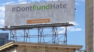 Billboard with slogan #DontFundMe