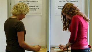 Two women at polling station