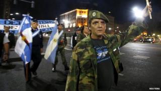 Veterans of the 1982 Falklands War marching on the eve of the 33rd anniversary of the conflict