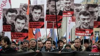 People march in memory of Russian opposition leader and former Deputy Prime Minister Boris Nemtsov in central Moscow