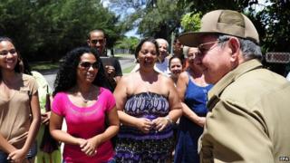 Raul Castro votes in local elections in Cuba with supporters April 2015