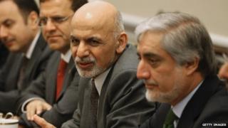 Afghanistan President Ashraf Ghani (L) and Afghanistan Chief Executive Officer Abdullah Abdulla (R) attend a bipartisan meeting with members of the House leadership on Capitol Hill March 25, 2015 in Washington, DC.