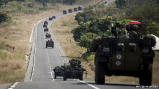 French military arriving from Cameroon, drive on a road leading to Bouar, CAR, on December 7, 2013.
