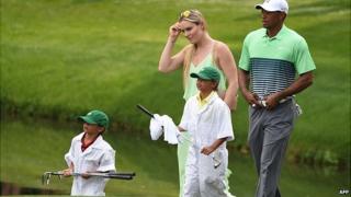 Tiger Woods and Lindsey Vonn during golf competition in Augusta, Georgia. 8 April 2015