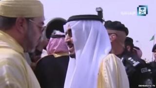Video frame showing Mohammed al-Tobayshi (centre), King Mohammed of Morocco (left) and King Salman (right) at Riyadh airport