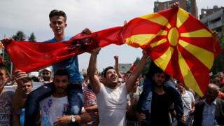 Anti-government protesters wave Albanian and Macedonian flags in Skopje protest (17 May)