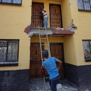 residents using stepladder