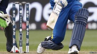 Sri Lanka"s captain Angelo Mathews hits the ball for six runs as Scotland"s wicketkeeper Matt Cross (L) watches during their Cricket World Cup match in Hobart March 11, 2015