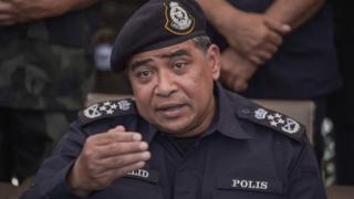 Malaysian national police chief Khalid Abu Bakar speaks during a press conference a day after the government announced the discovery of camps and graves, the first such sites found in Malaysia since a regional human-trafficking crisis erupted earlier this month, near Malaysia-Thailand borders in Wang Kelian on May 25, 2015.