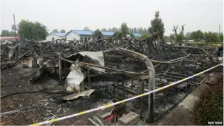 Remains of burned building in Pingdingshan, China (26 May 2015)