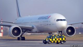 An aircraft Boeing 777 of French airline Air France stands on the airport Tegel, Berlin, on January 31, 2012.