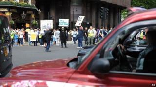 Drivers with placards protesting