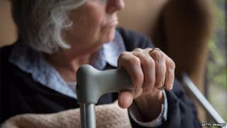 An elderly woman at home