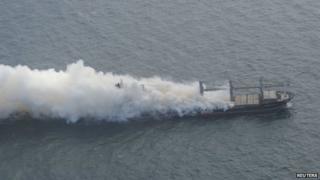 Handout of Purple Beach on fire