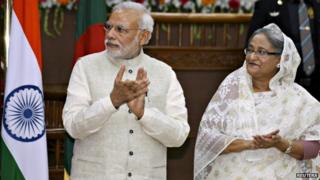 Mr Modi (left) and Bangladesh Prime Minister Sheikh Hasina (right) signed important deals on Saturday