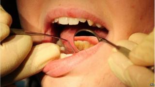 Обследование зубов