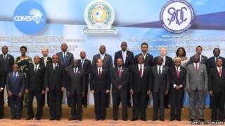 Egypt's President Abdel Fattah al-Sisi posing for a picture with officials and attendants of the African summit meeting in the Egyptian resort of Sharm el-Sheikh