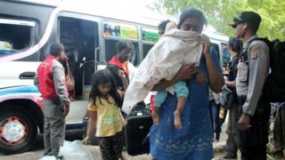 Migrants from Bangladesh, Myanmar and Sri Lanka arriving in Kupang, East Nusa Tenggara province, after they were intercepted en route to New Zealand by the Australian navy