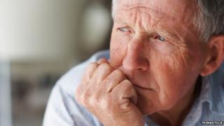 Elderly man thinking