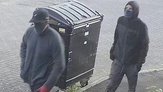 CCTV image of men