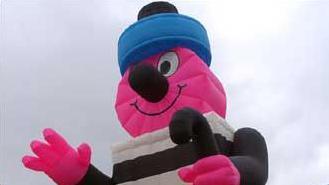 Inflatable liquorice Bertie Bassett with sweets making up parts of his body.