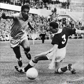 Brazilian forward Garrincha and Welsh defender Mel Hopkins during the 1958 World Cup quarter final in Goteborg, Sweden