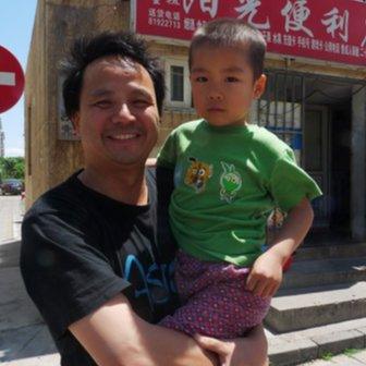 Environmental campaigner Feng Yongfeng and his son
