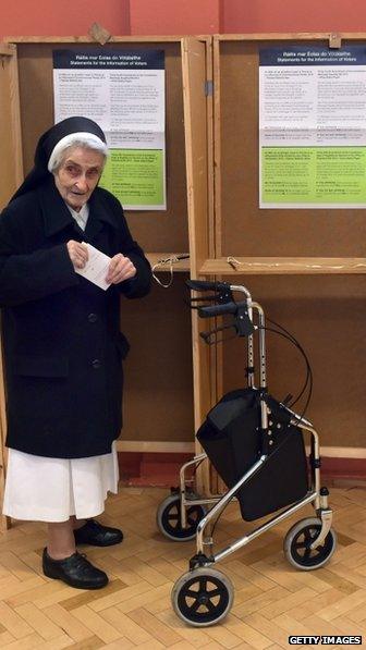 A nun casts her vote at a polling station in Dublin
