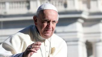 Pope Francis waves to the faithful as he arrives in St, Peter's square for his weekly audience on September 26, 2018 i