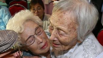 North Korean Cho Soon-Do, 89 (R) meets with her South Korean sister Cho Hae-Do, 86, and brother Cho Do-Jae, 75